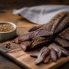 Traditional biltong spice blend ingredients including salt, black pepper, and coriander seeds