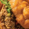 Delicious golden vetkoek freshly fried and ready to serve