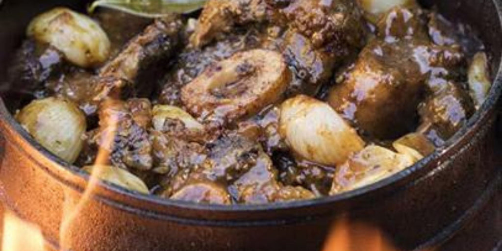 Shin and Oxtail Beef Potjie stew in a traditional pot