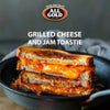 Grilled cheese sandwich with melted cheese and All Gold smooth apricot jam filling on toasted bread