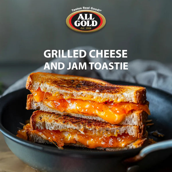 Grilled cheese sandwich with melted cheese and All Gold smooth apricot jam filling on toasted bread