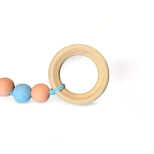 Baby wooden teething ring with food-grade silicone beads, safe and natural for infants.