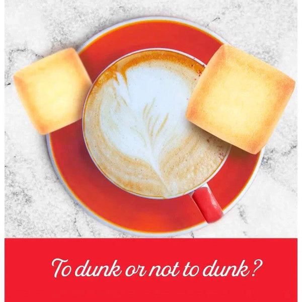 Bakers Eet-Sum-Mor shortbread biscuits with coffee in red cup on marble table