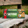 Bakers Salticrax Salted Crackers - 200g box on wooden bench outdoors.