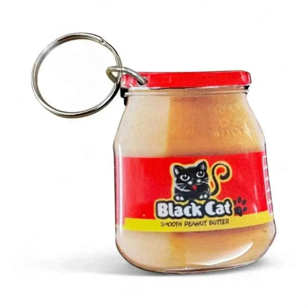 Black Cat Peanut Butter jar shaped keyring with red label and black cat logo in resin design