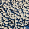 Close-up of black granite briquettes made from natural Namibian hardwood for grilling and BBQ use