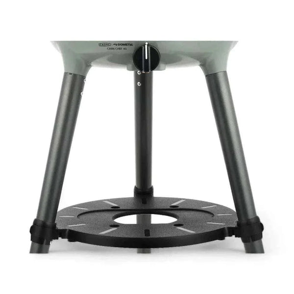 CADAC Carri Chef 40 BBQ with screw-on legs and adjustable foot for outdoor cooking.