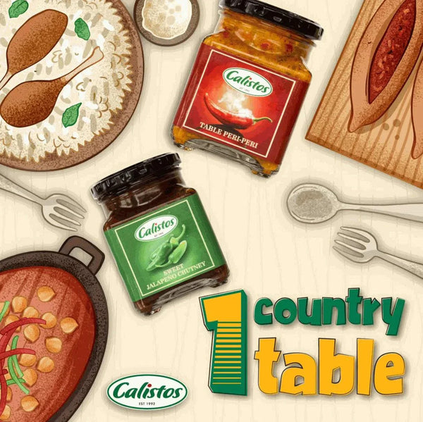 Calisto's Salsa bottles with savory dishes on a rustic table setting.