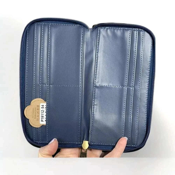 Cotton Road Large Wallet open showing navy PU leather interior with multiple card slots and compartments