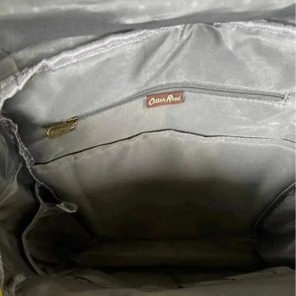 Mustard Cotton Road nappy bag backpack with front zip and side bottle pockets