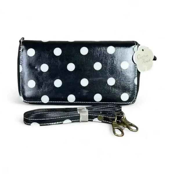 Cotton Road Sling Wallet black PVC with large white polka dots and removable strap