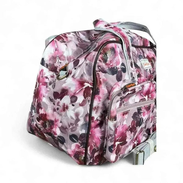 Light pink Cotton Road Travel Bag with purple rose print and adjustable strap