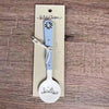 Enamel sugar spoon with wooden handle and farmhouse flower design engraving