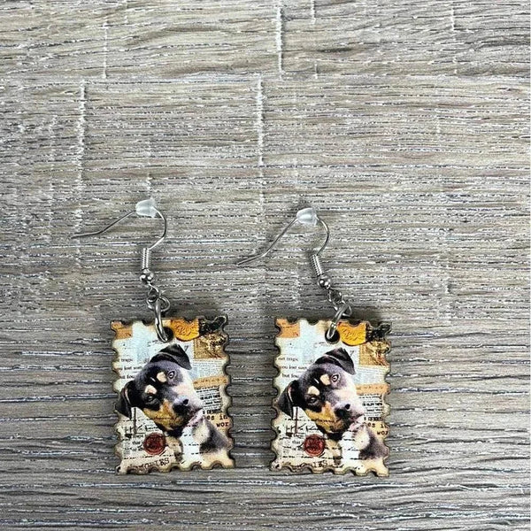 Hanging earrings featuring postage stamp design with a dog, nickel free, made in South Africa, sold in pairs
