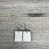 Hanging earrings featuring a postage stamp design with a donkey's nose, nickel-free, sold in pairs, made in South Africa