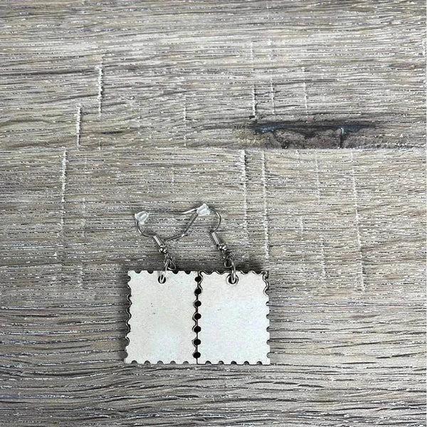 Hanging earrings featuring a postage stamp design with a donkey's nose, nickel-free, sold in pairs, made in South Africa