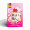 Box of Hug-in-a-Mug Toasted Marshmallow Cappuccino single-serve sticks with creamy coffee drink