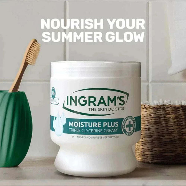 Ingrams Moisture Plus Triple Glycerine Cream 450g for deep hydration on wooden bathroom counter.