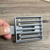 Small grey plastic Koeksister cutter for traditional Afrikaans fried dough pastries