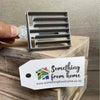 Small grey plastic Koeksister cutter for shaping traditional Afrikaans dough