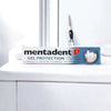 Mentadent P Gel Protection toothpaste tube on a white sink with a toothbrush in the background.