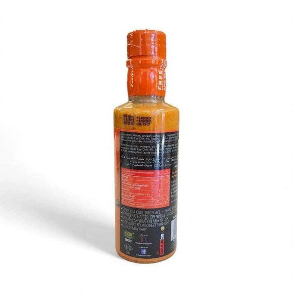 250ml bottle of Calisto's Peri Peri Sauce - Hot, adding bold heat and flavor to meals.