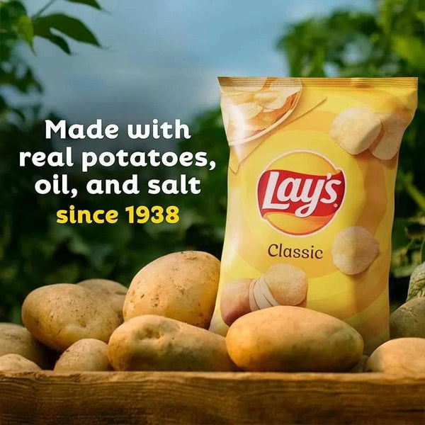Simba Lays salted classic chips bag with fresh potatoes background, perfect for school lunch boxes