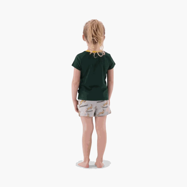 Back view of child wearing Springbok Pajamas kids set with green top and printed shorts