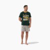 Man wearing 2XL Springbok Pajama Set with green rugby dad shirt and logo shorts