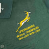 Green Springbok Official Licensed Supporter T-Shirt with yellow logo and "World Champions 1995-2007-2019-2023" embroidery