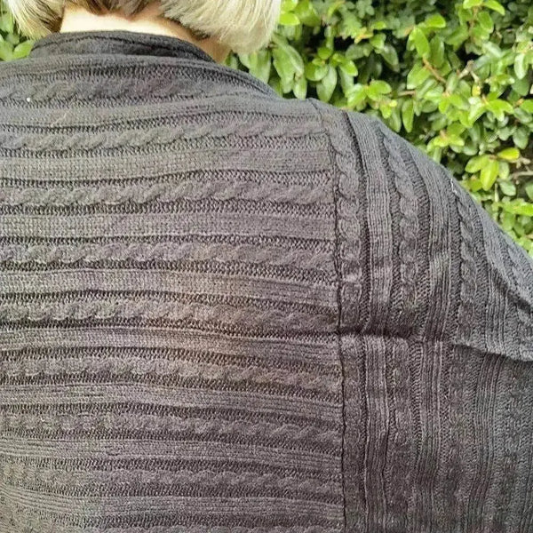 Black knitted Winter Poncho with round neck by Cotton Road
