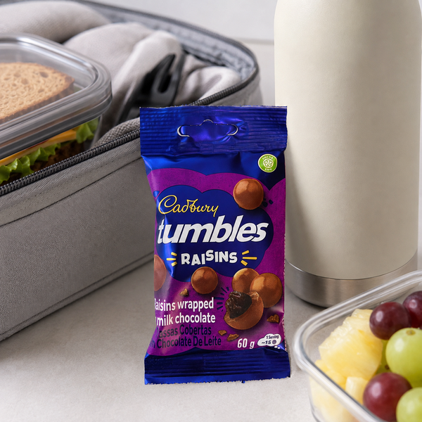 Cadbury Tumbles Raisins 60g in an adult lunchbox setting