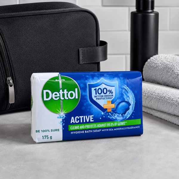 Dettol Active Bath Soap 175g beside gym wash bag and towels