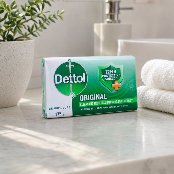 Dettol Original Bath Soap 175g beside white towels on a bright bathroom vanity