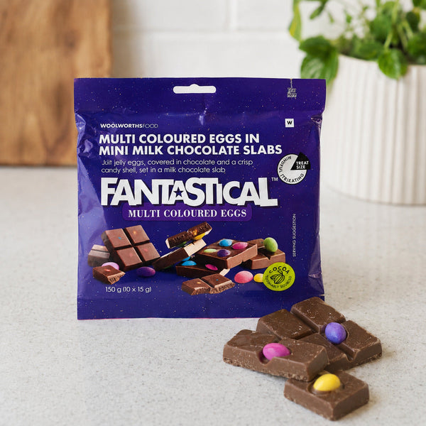 Woolworths Fantastical 150g mini chocolate slabs with colourful eggs on a kitchen counter