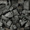 Close-up of natural lump charcoal pieces used for grilling and smoking