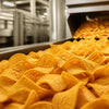 Corn chips, Fritos: The Iconic Corn Chip, golden and crunchy with a ridged surface and curved shape