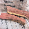 Stack of premium firewood bundles including Tea Tree and Kameeldoring wood for heating and grilling