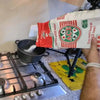 ACE Super Maize Meal being poured into a cooking pot