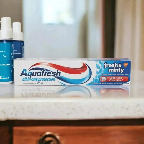 Aquafresh Fresh & Minty toothpaste box on a bathroom counter