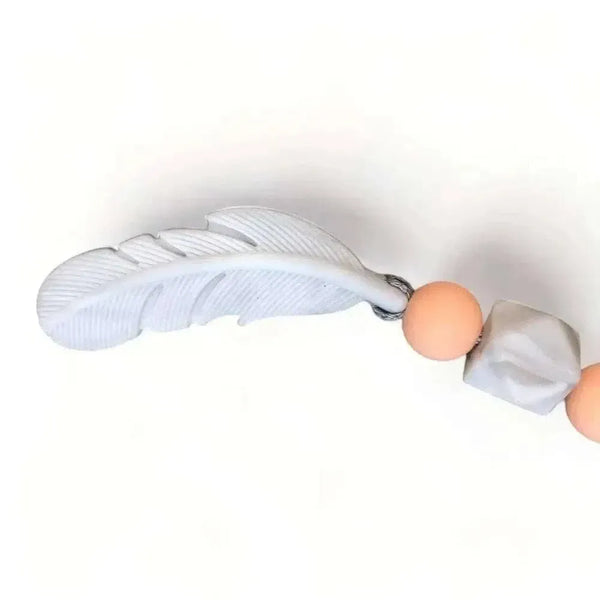 Natural wooden and silicone baby teething ring, 40mm diameter, safe and allergen-free, handmade in South Africa.