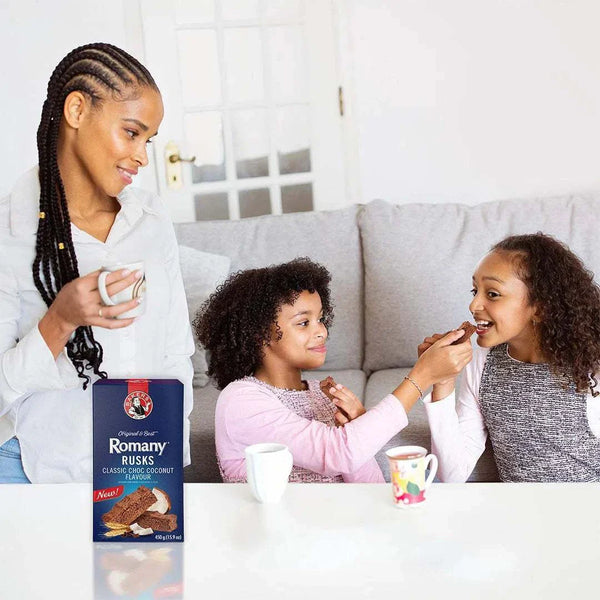 Family enjoying Bakers Romany Classic Choc Coconut Rusks with tea.