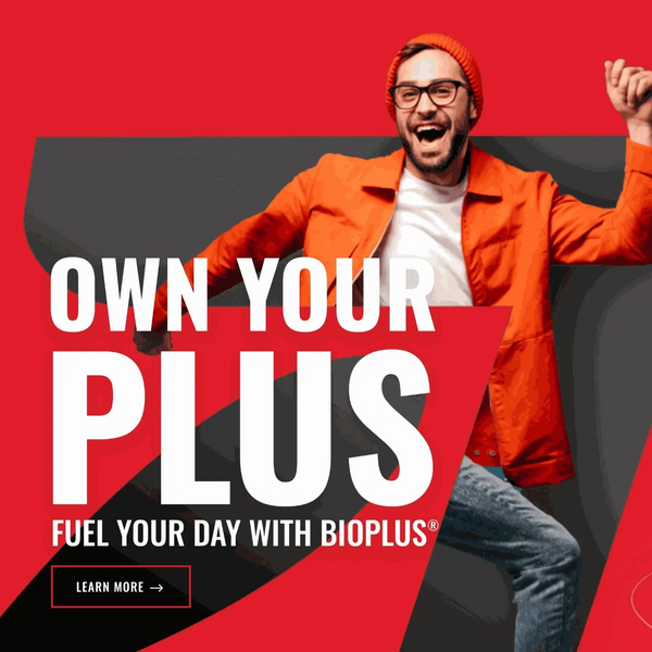 Energetic man celebrating against red background promoting Bioplus Syrup 500ml for energy and focus boost