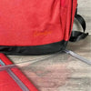 Deep red Cotton Road Nappy Bag backpack with multiple compartments and side bottle pockets