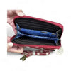 Cotton Road sling wallet in red PVC with large white dots and removable strap