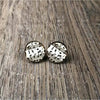White earrings with music notes design, 15mm diameter, sold in pairs