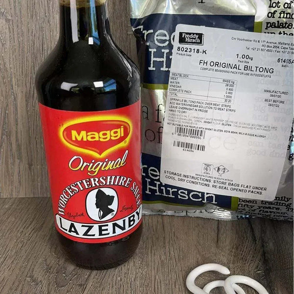 Bottle of Maggi Worcestershire Sauce and pack of Freddy Hirsch Original Biltong Spice for making biltong ingredients
