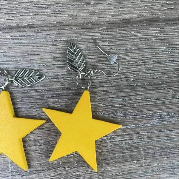 Hanging earrings mustard wooden stars 40mm pair