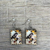 Hanging earrings featuring postage stamp design with a dog, nickel free, made in South Africa, sold in pairs