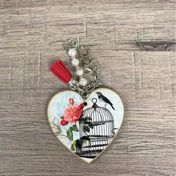 Heart key tags with bird in cage design and navy tassel